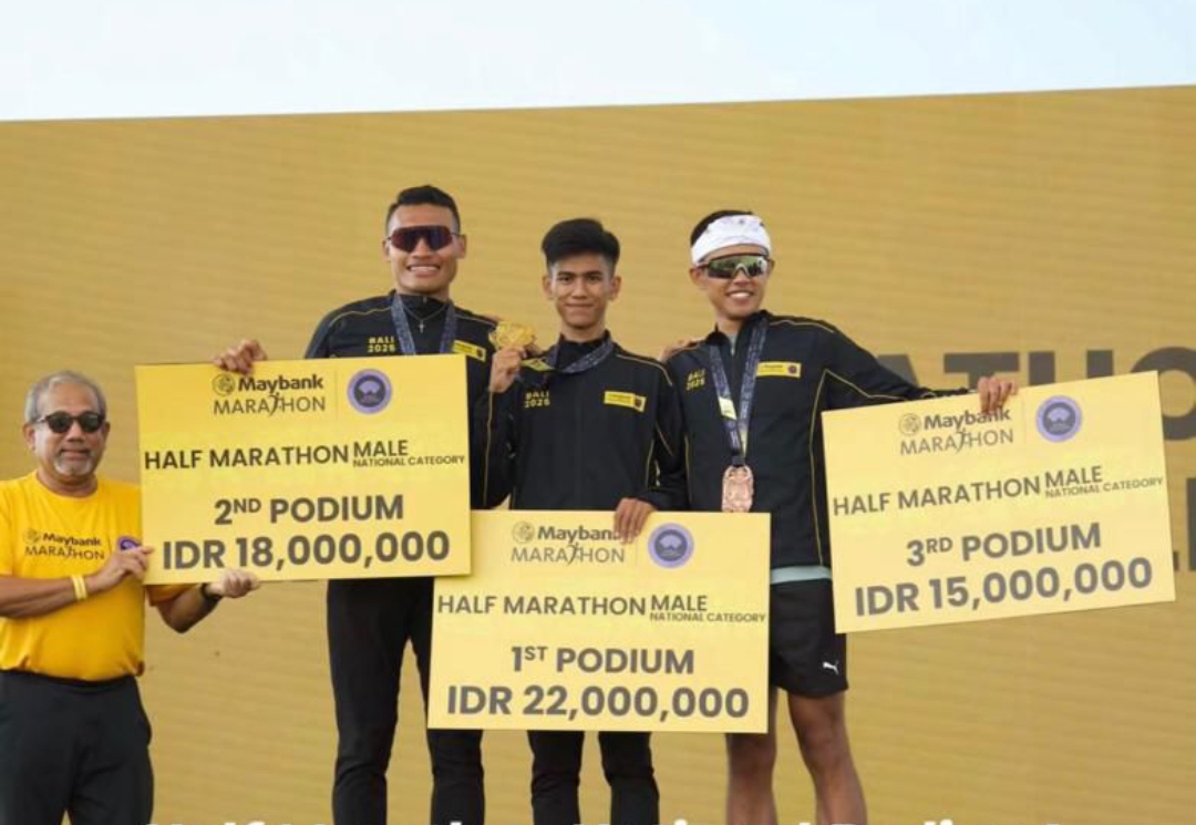 Iqbal Saputra, atlet PASI Kota Padang usai menjuarai Half Marathon 21 km Maybank Bali International Marathon 2025.(Foto: IST via Prokopim)
