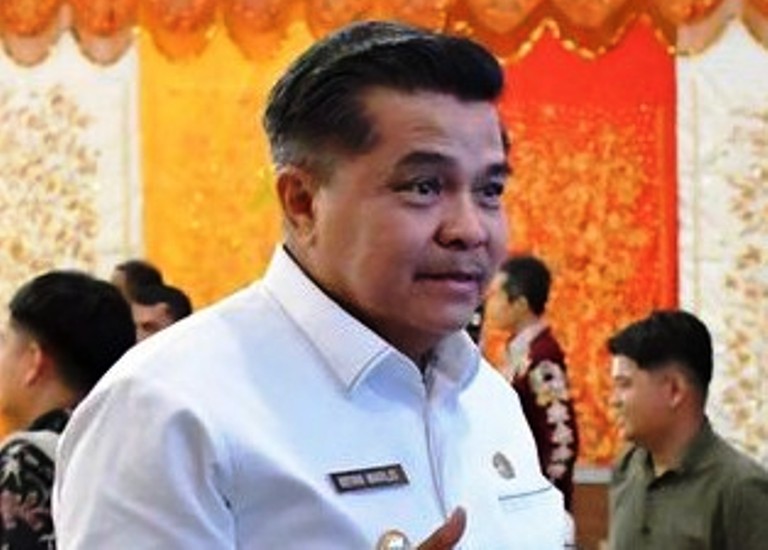 BENNI WARLIS, Bupati Agama
