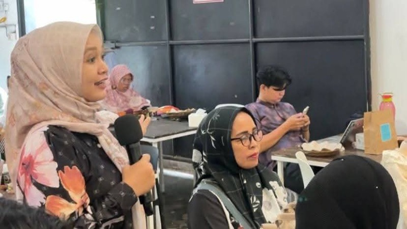 Kegiatan sosialisasi dan diskusi Hak Atas Kekayaan Intelektual (HAKI) yang digelar Dinas Koperasi dan UMKM Padang di Cafe Kupi Batigo, Sabtu (18/10/2025).