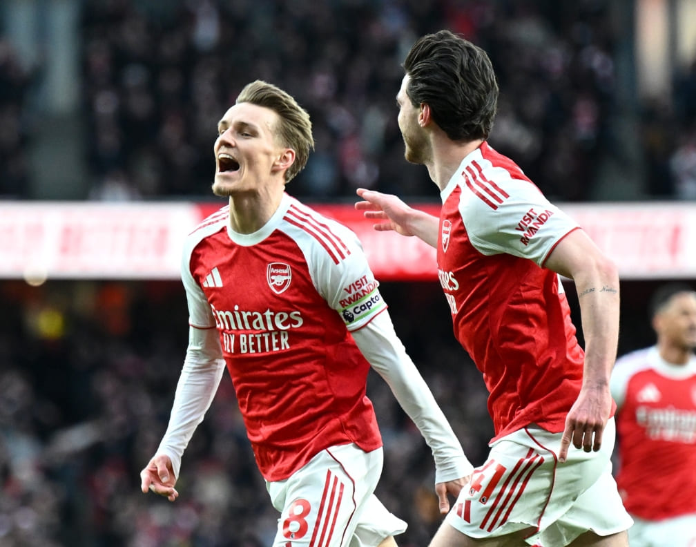 Bintang Arsenal Martin Odegaard merayakan gol pembuka ke gawang Brighton pada laga pekan ke-18 Premier League di Emirates Stadium, London, 27 Desember 2025.(Foto: Arsenal)
