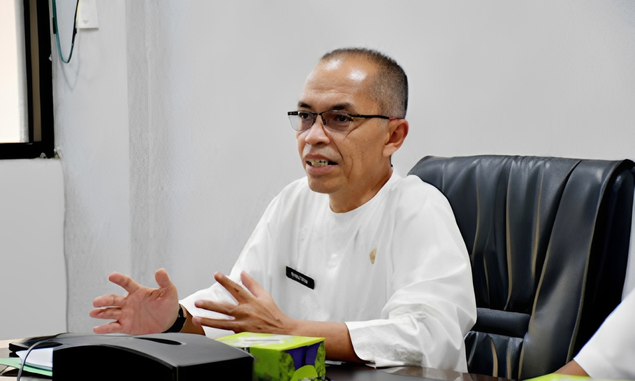 Asisten III Setda Agam, Syatria, saat pemaparan pengelolahan sampah dalam rapat berkerjasama dengan Koperasi Industri Insinyur Indonesia, Jumat (31/01/2026).