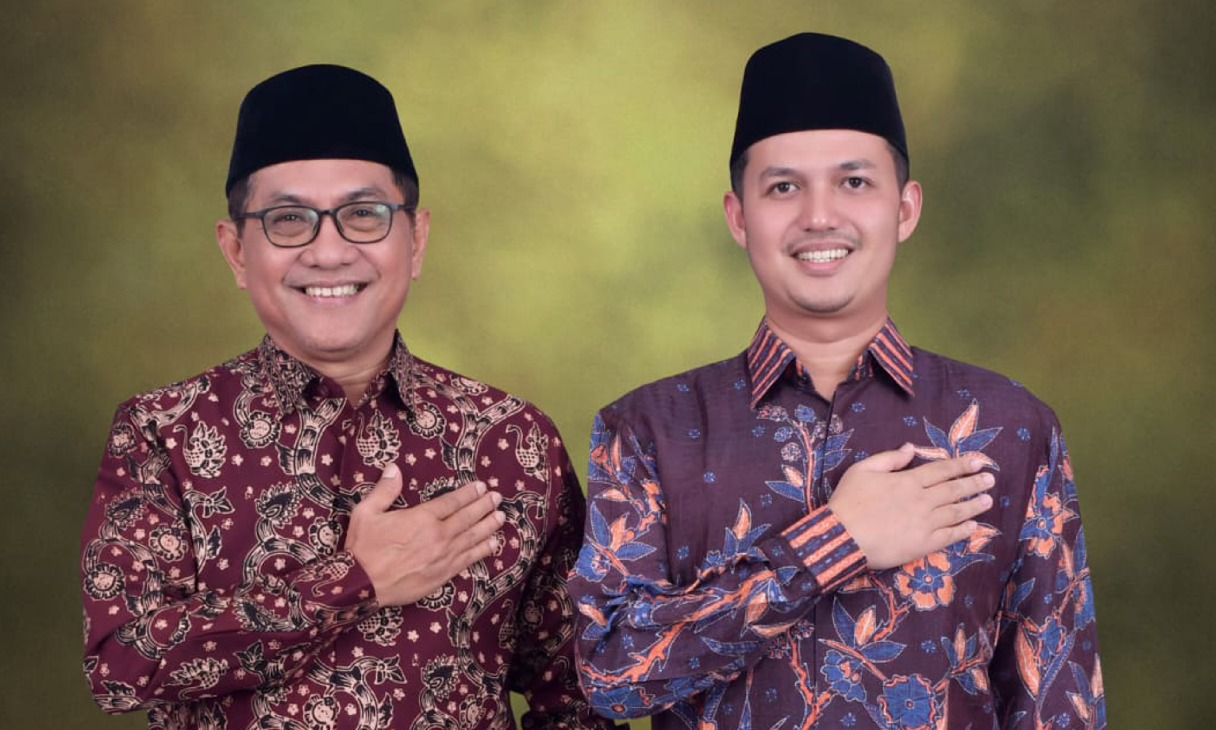 Dr. H. Jhon Kenedy Azis, SH, MH (kiri)
