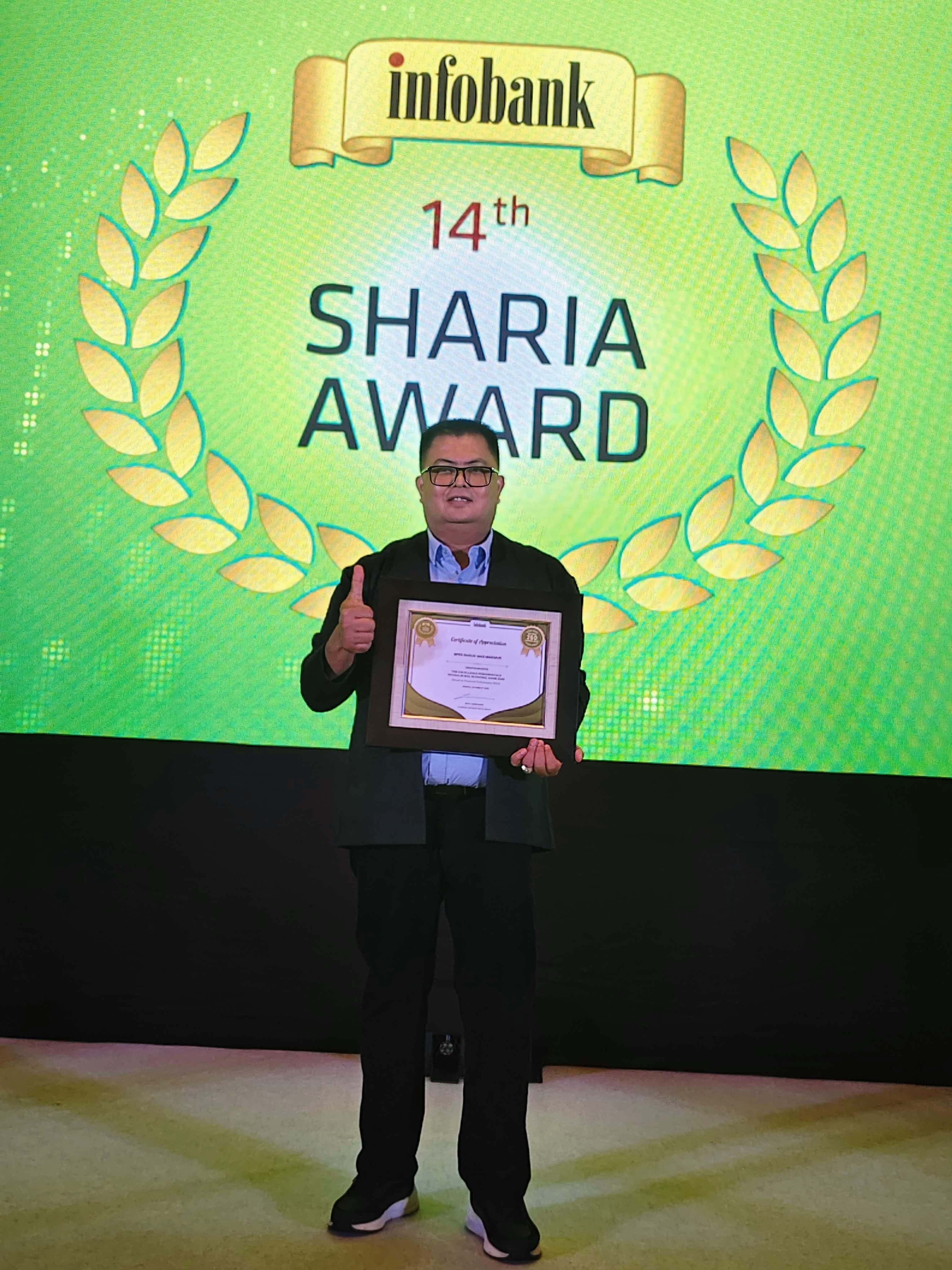 Direktur Utama PT BPRS Guguk Mas Makmur, Yuhelmi Afrizon.