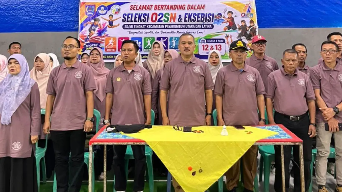 2SN Kadis Pendidikan Kota Payakumbuh Nalfira, S. Pd. M. SE dan dihadiri K3S Utara Latina saat membuka kegiatan seleksi O2SN & Eksebisi SD/MI Tingkat Kecamatan Payakumbuh Utara dan Latina beberapa waktu lalu. (TIM LAMAN GURU)