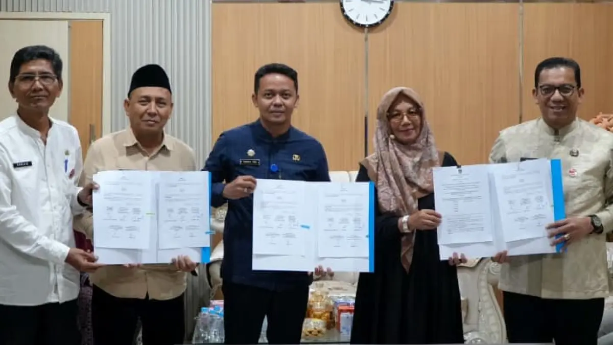 Inspektorat Kota Padang menandatangani kesepakatan E-Audit terintegrasi untuk pengawasan berbasis data real-time.(Foto: Diskominfo)