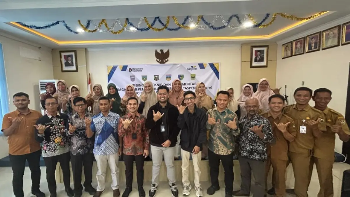 Tim Taspen bersam peserta dari empat pemerintah daerah usai mengikuti Bimtek dan Implementasi SIMGAJI Web di Bukittinggi.(Foto: Humas)