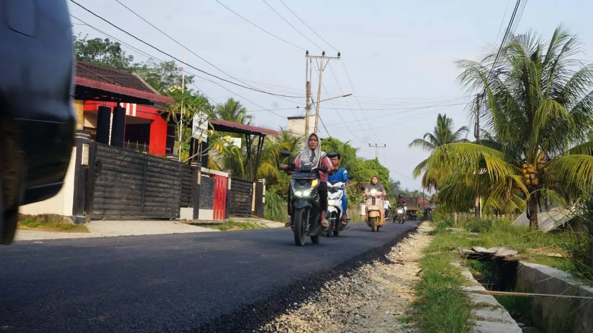 Jalan di belakang eks RSUD Sungai Dareh, Nagari IV Koto Pulau Punjung, Kabupaten Dharmasraya, kembali mulus usai direhabilitasi.