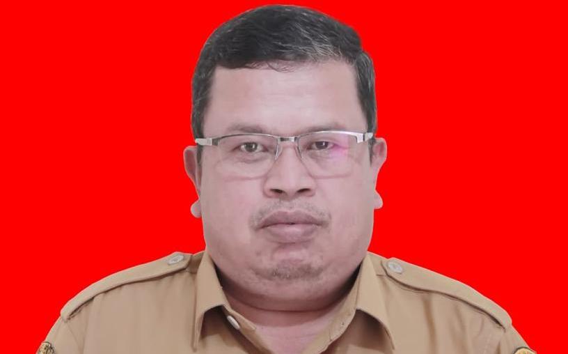 Drs. Faisal Adri Guru UPTD SMPN 3 Kecamatan Bukikbarisan