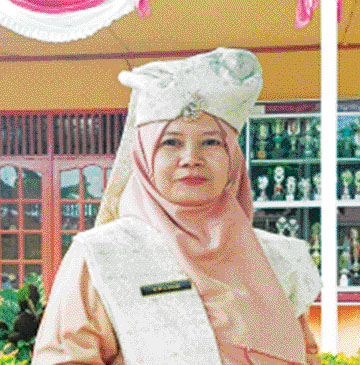 Erlina S.Pd.SD (KEPALA SDN 46 PAYAKUMBUH