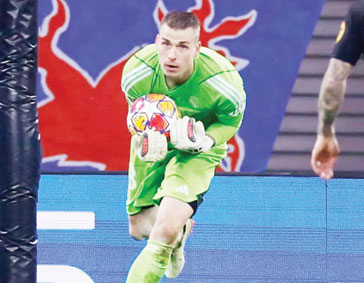 KIPER PIAWAI: Kiper Andriy Lunin menjadi penyelamat untuk Real Madrid pada ajang Liga Champions.(REALMADRID/MEDIA X)