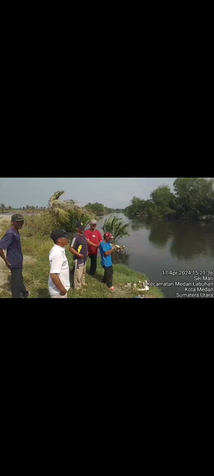 GEMPAR; Kemunculan buaya muara yang sempat viral di media sosial, menggemparkan warga di Lingkungan I, Kelurahan Sei Mati, Kecamatan Medan Labuhan, Rabu (17/04/2024).