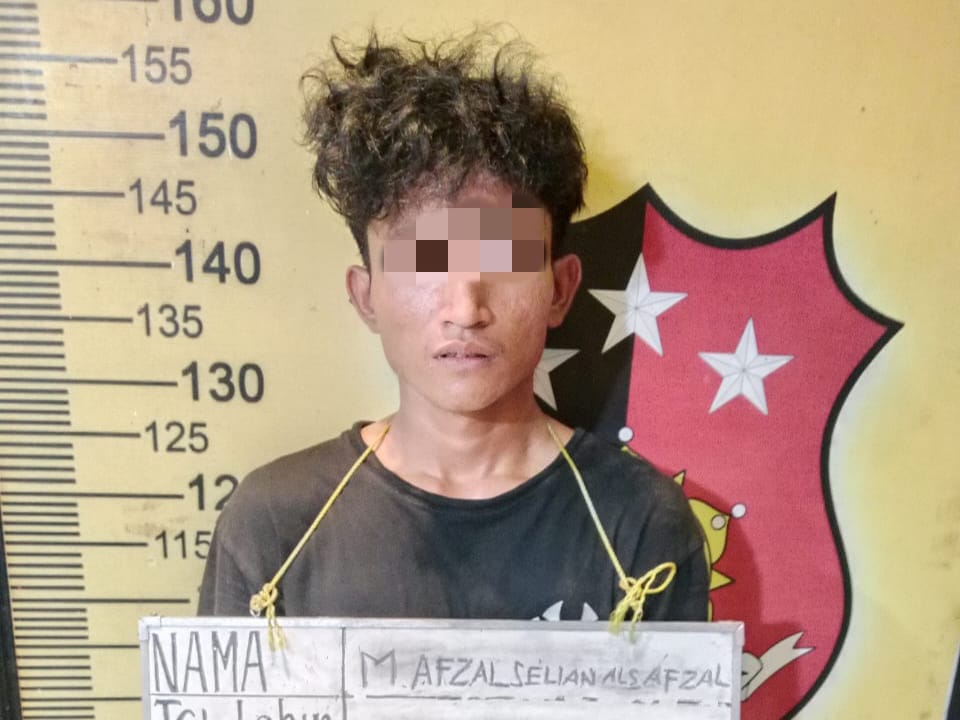 DIAMANKAN: Tersangka, Afzal saat diamankan.