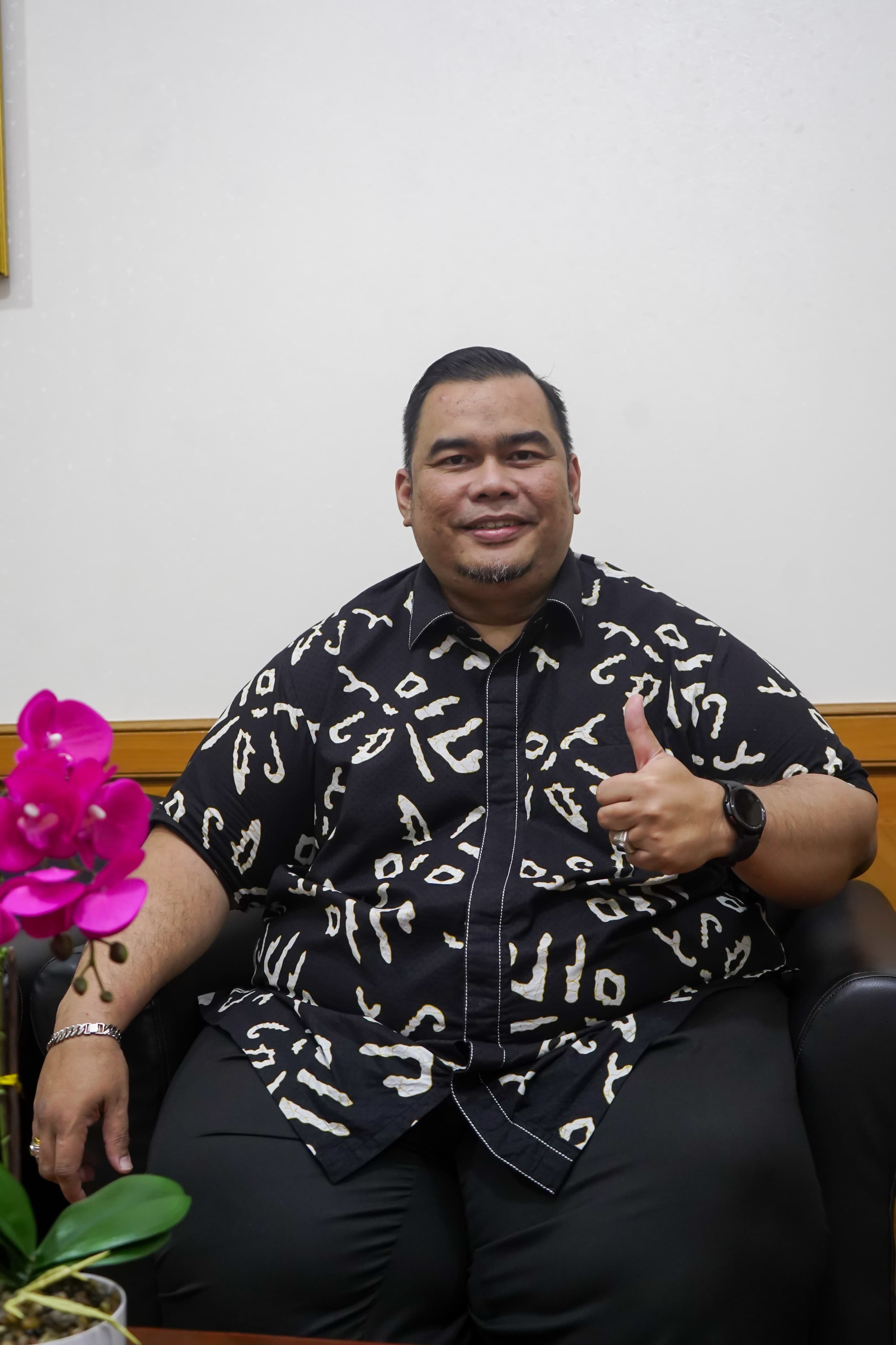 Dr Christian Orchard Perangin-Angin, SH, MKn, CLA.