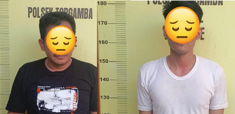 DIAMANKAN: Kedua tersangka saat diamankan di Polsek Torgamda. KHAIRUDIN/SUMUT&nbsp;POS