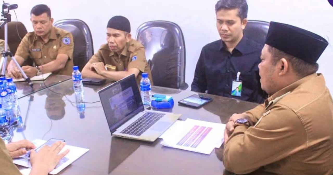 Wakil Bupati Labuhanbatu Jamri memaparkan pencapaian Universal Coverage Jamsostek (UCJ) Kabupaten Labuhanbatu (FAJAR/SUMUT POS)