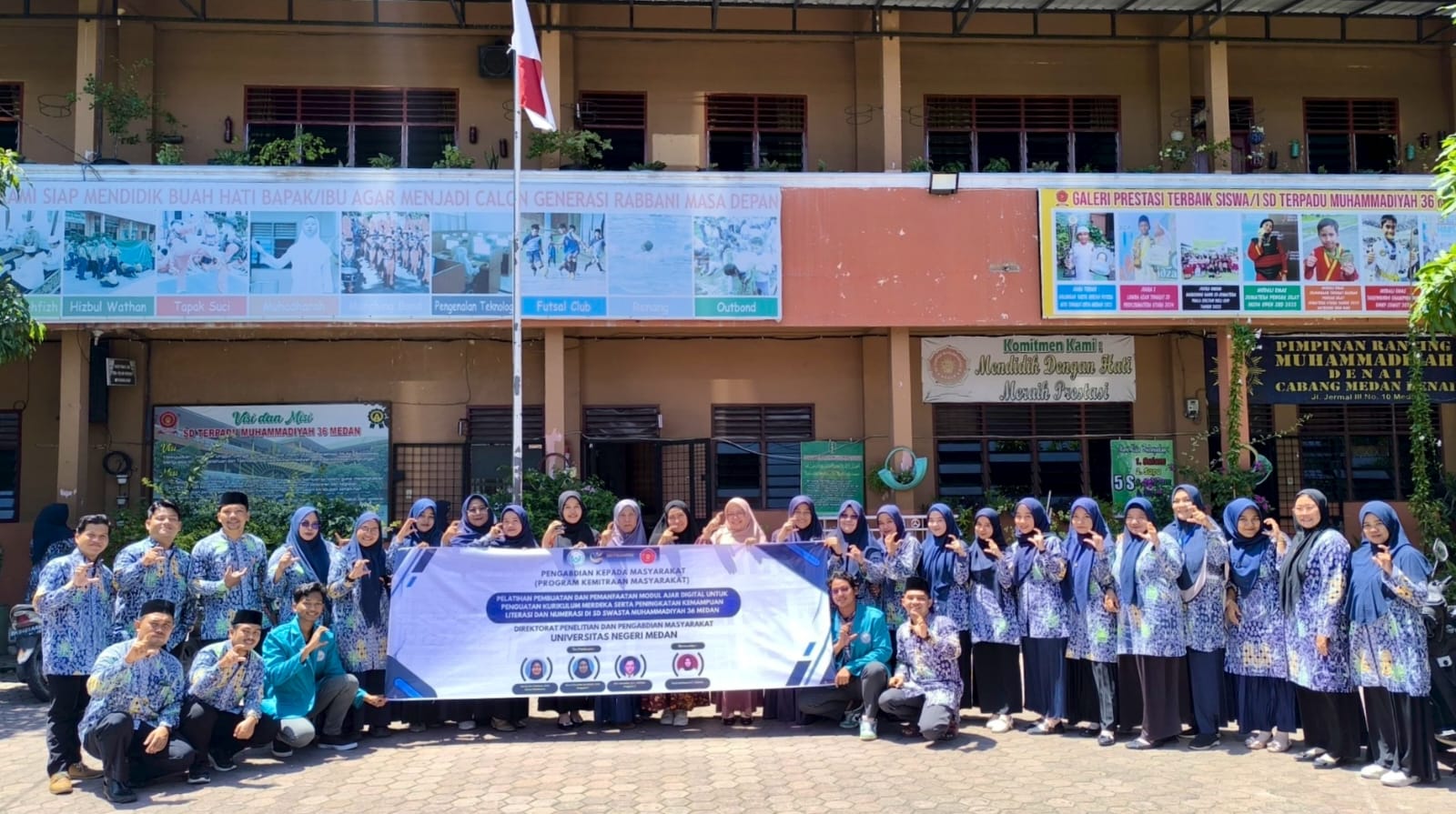 PKM: Dosen Unimed bersama Unhar melaksanakan kegiatan PKM di SD Swasta Muhammadiyah 36 Medan. (ISTIMEWA/SUMUT POS)