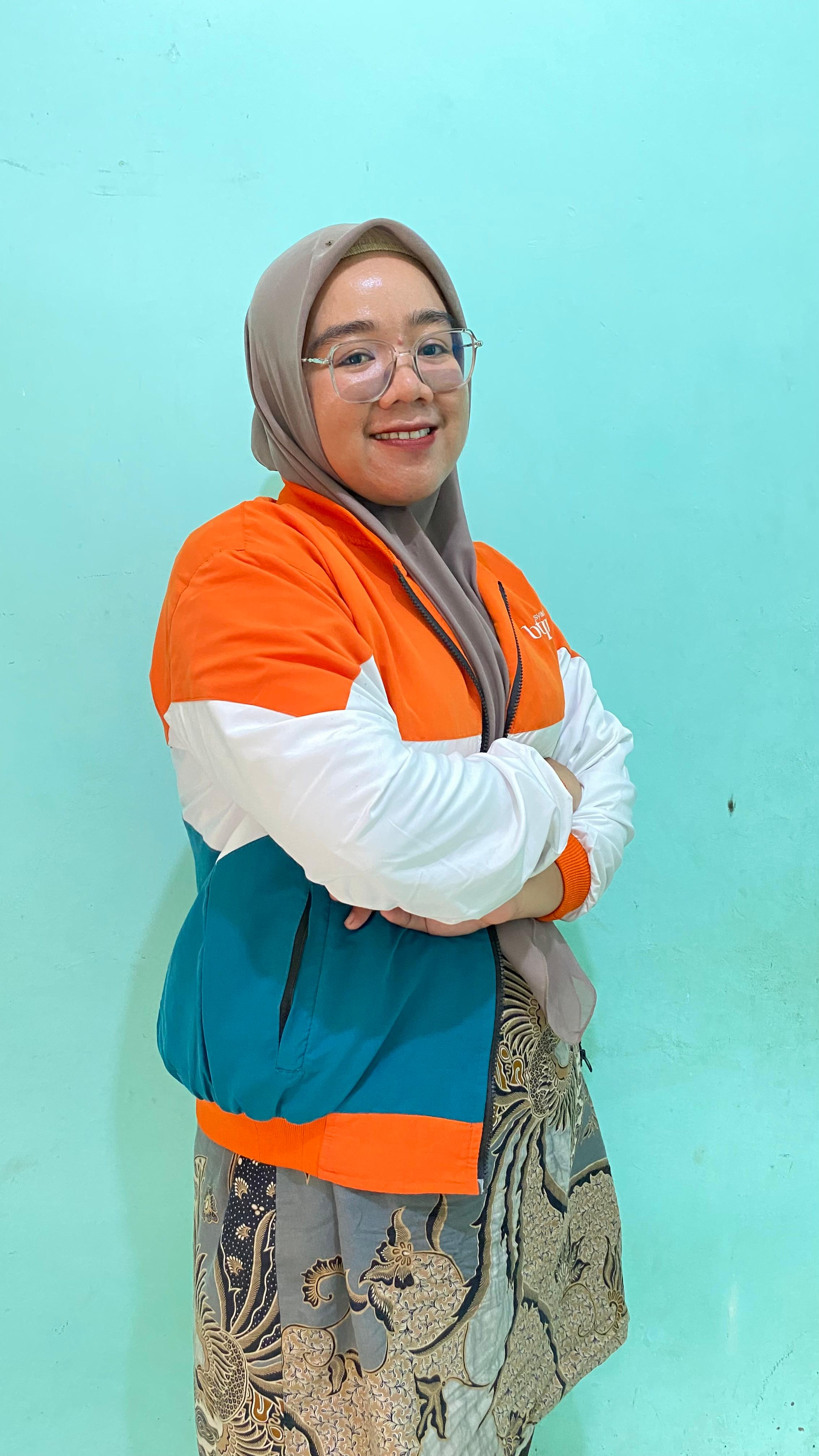 Mina Mardiana, Community Officer yang bertugas di Kabupaten Batu Bara, Provinsi Sumatera Utara.