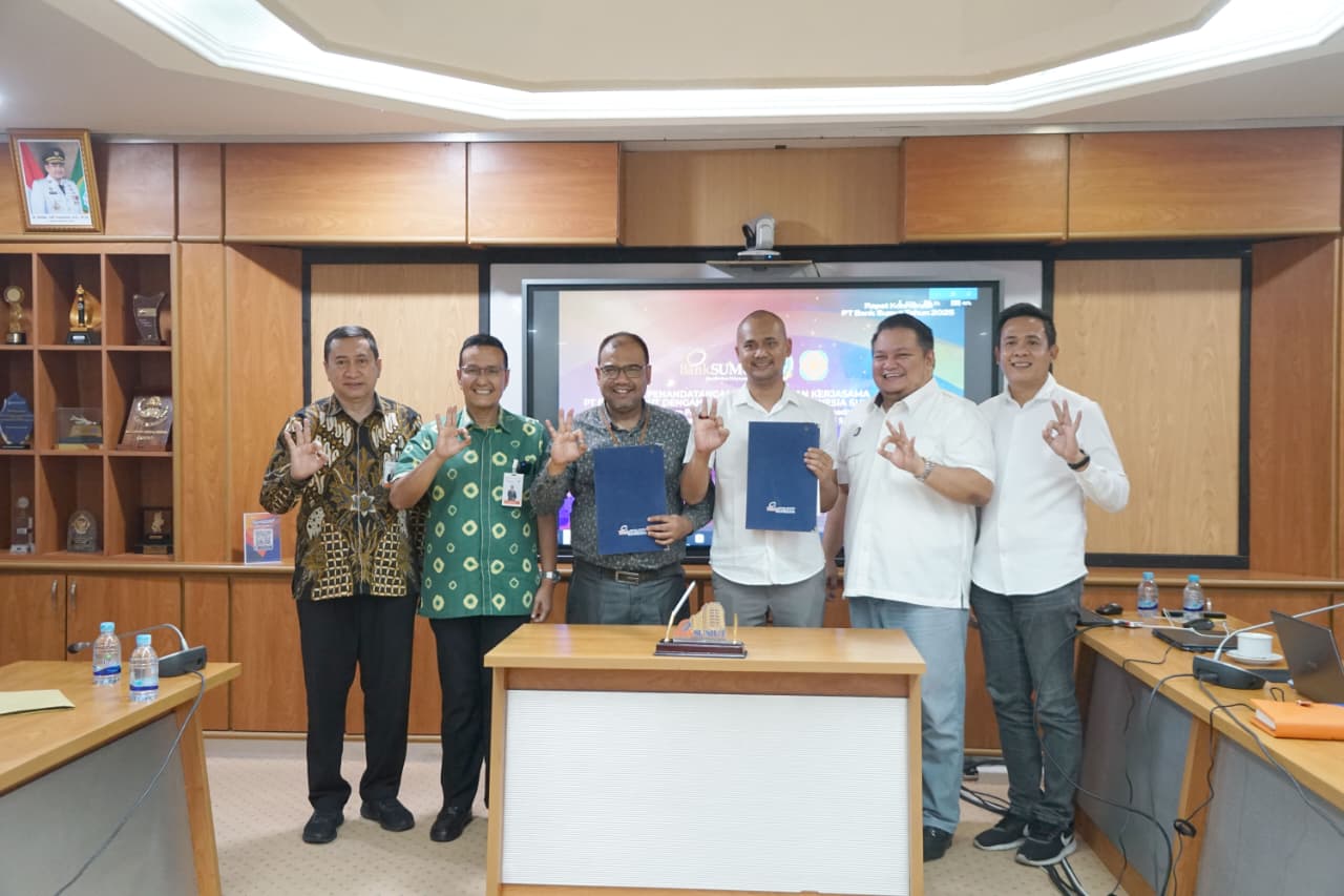 TANDA TANGAN: Bank Sumut dan DPD REI Sumut melakukan penandatanganan Perjanjian Kerja Sama (PKS) dalam rangka percepatan menindaklanjuti komitmen merealisasikan 20.000 rumah.