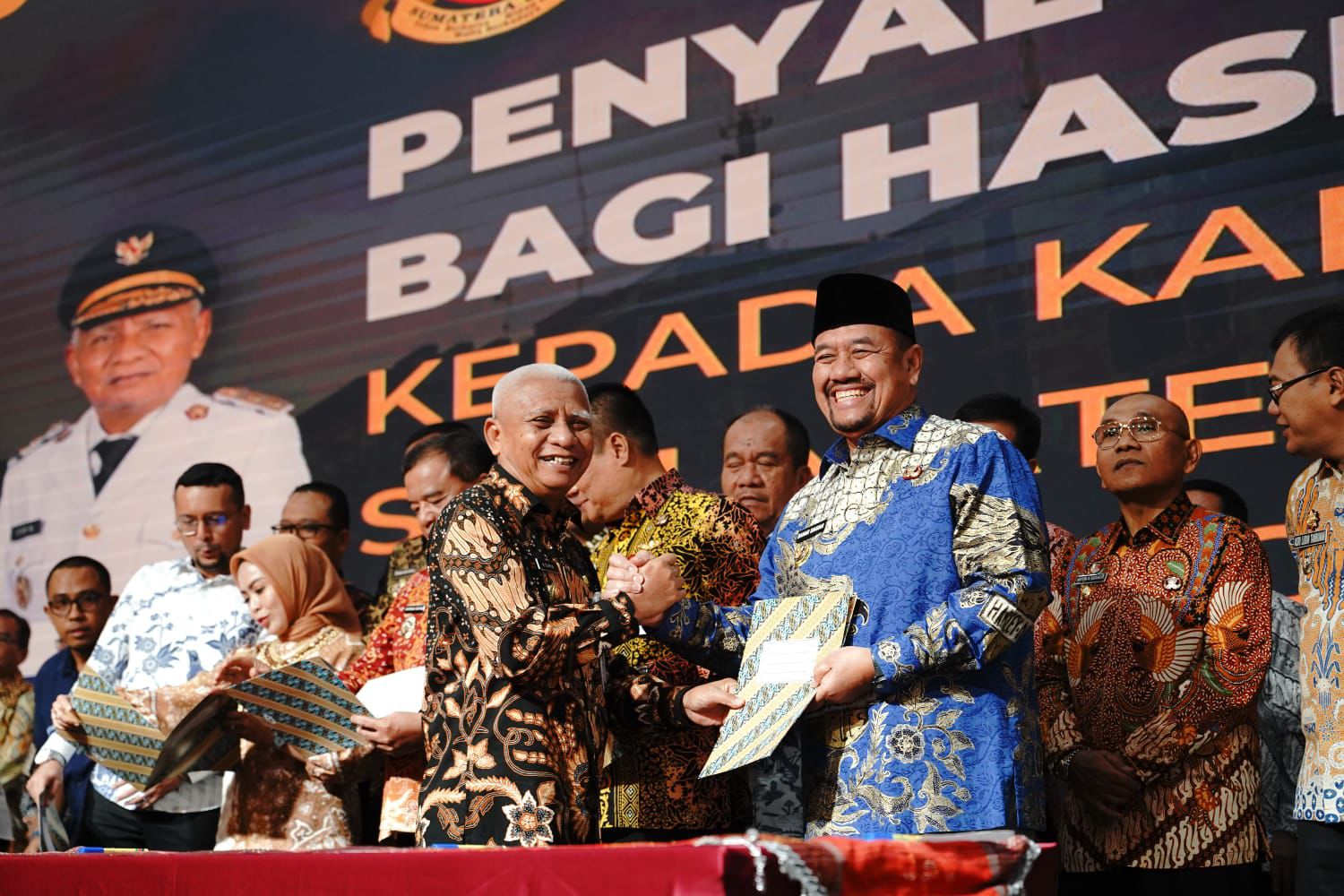 Bupati Batubara  H. Baharuddin Siagian, SH, M.Si saat menghadiri  kegiatan Penguatan Penerapan Manajemen Talenta ASN di Medan. (KOMINFO BATUBARA/SUMUT POS)