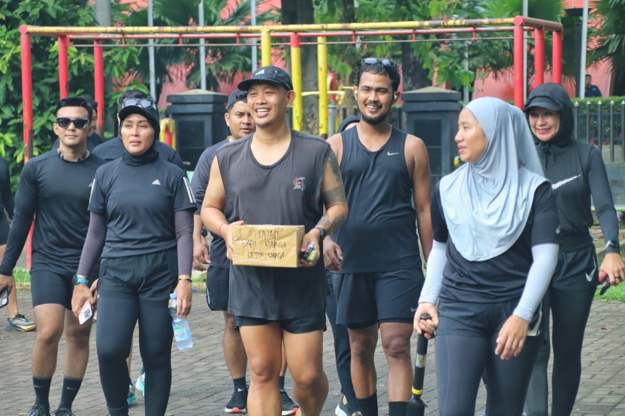 Puluhan anak muda Medan berlari sambil menggalang dana untuk membantu masyarakat terdampak bencana Aceh.