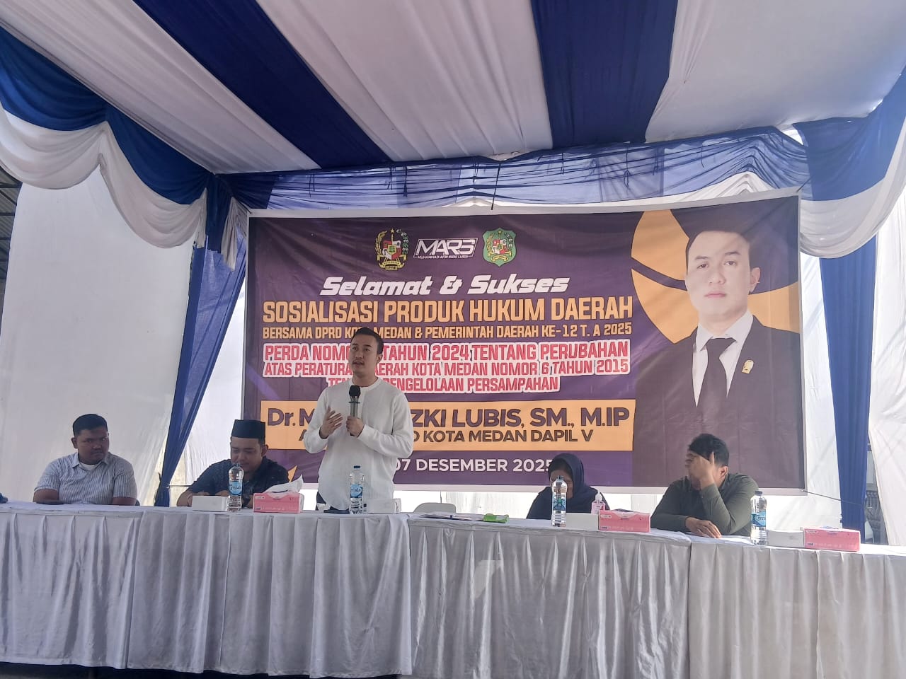 Anggota DPRD Kota Medan Fraksi Partai NasDem, M. Afri Rizki Lubis SM saat menggelar sosialisasi produk hukum daerah.( ISTIMEWA/SUMUT POS)