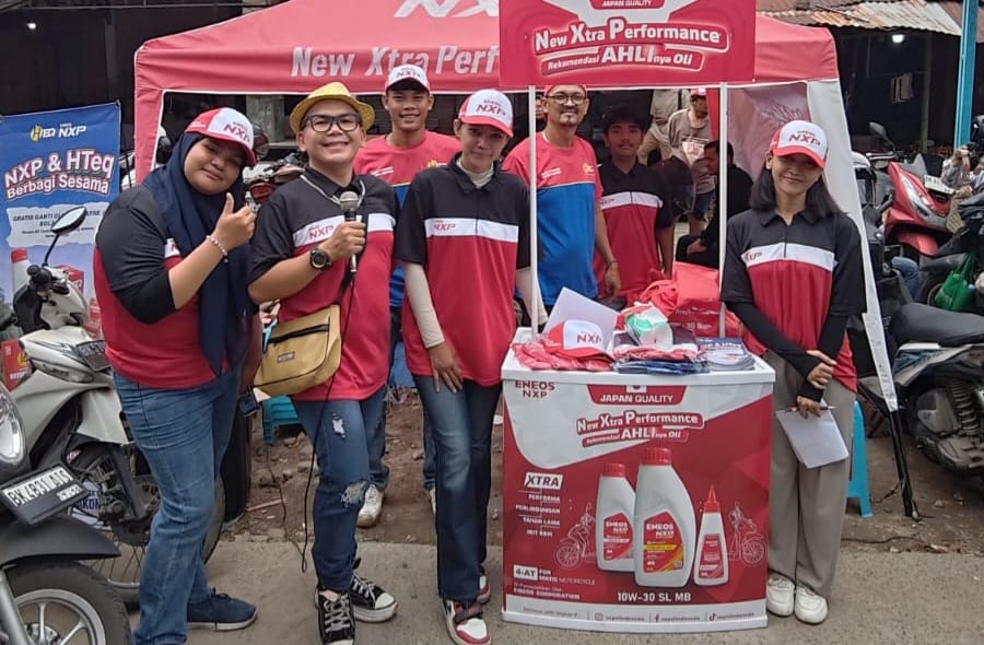 NXP dan HiTEQ hadir di Pasar Helvetia dengan layanan ganti oli dan suku cadang gratis untuk membantu warga Medan memulihkan kendaraan pascabanjir. (Dok Pribadi)