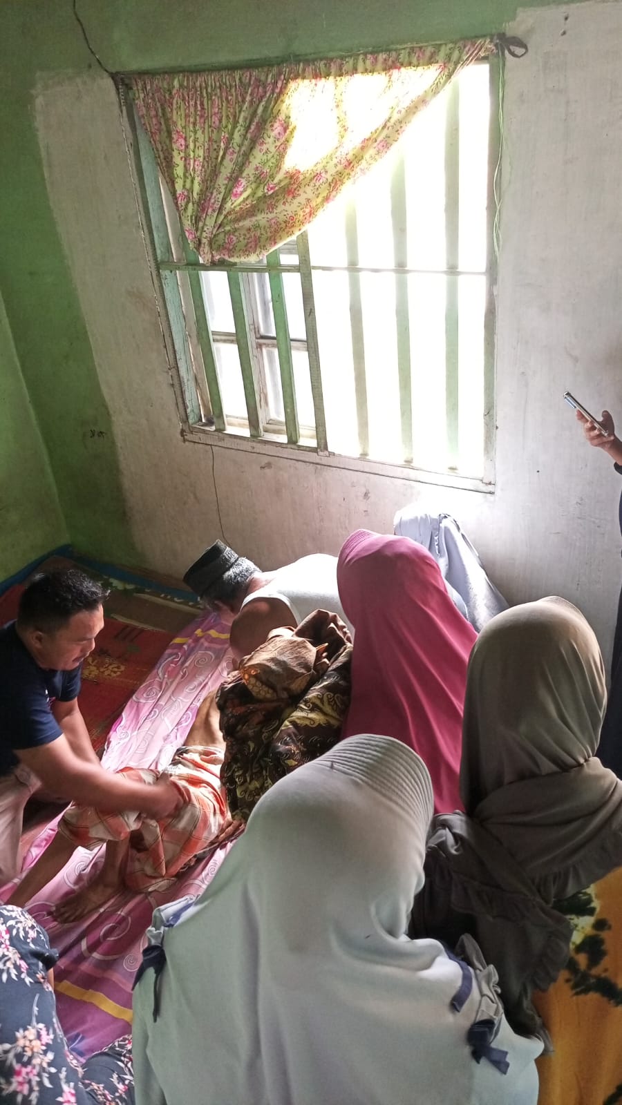 jasad   almarhumah Suliyem  saat disemayamkan  di rumah duka, Senin (2/2/2026). (Azan Purba/Sumut Pos)