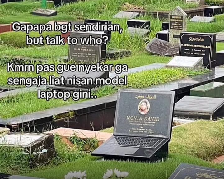 Batu nisan dengan bentuk tidak biasa, didesain menyerupai laptop. (Instagram @pandemictalks)