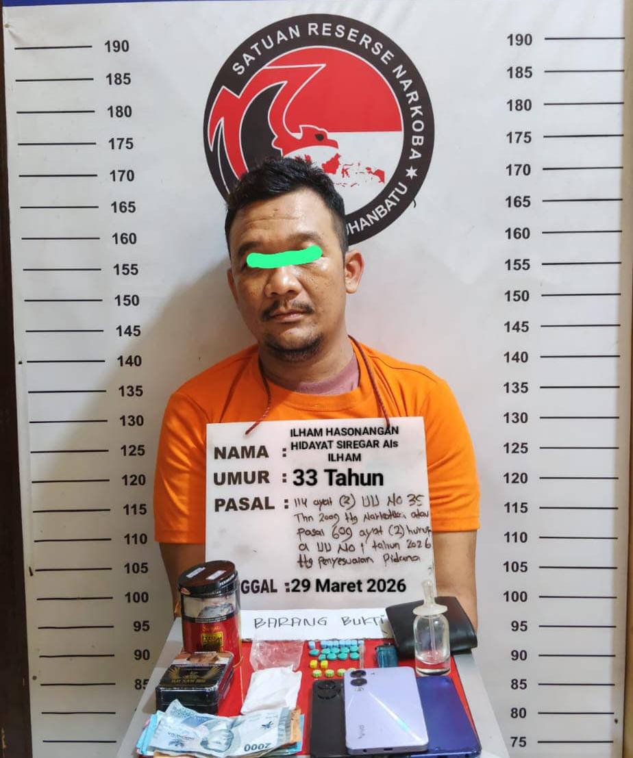Ilham saat diamankan di Polres Labuhanbatu.(Fajar/Sumut Pos)