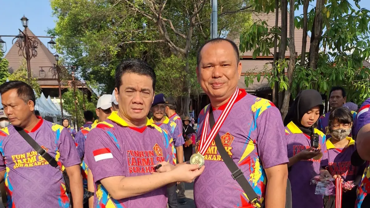 Rotua Sibagariang SST (kanan)