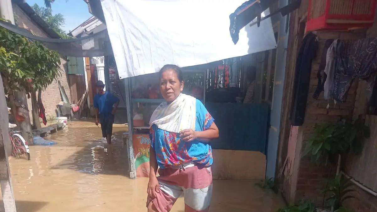 BANJIR:  Kondisi air Sungai Padang yang meluap dan merendam rumah warga terdampak banjir di Kelurahan Bandar Utama, Kota Tebing Tinggi, (11/05/2026). (Azan Purba / Sumut Pos)