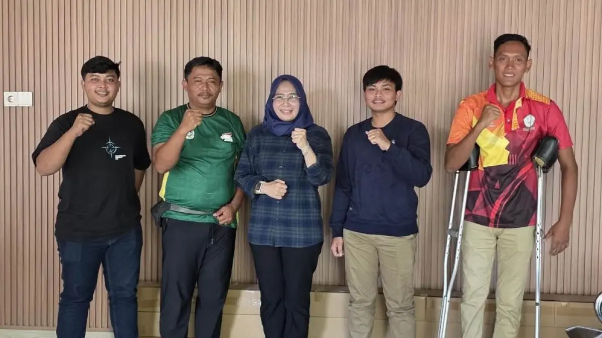 BERSAMA: Ketua STOK Bina Guna, Dr Hj Liliana Puspa Sari MKes bersama panitia Sirkuit Panahan 2026 Piala Wali Kota Tebingtinggu dan STOK Bina Guna. (Dok Perpani Sumut)