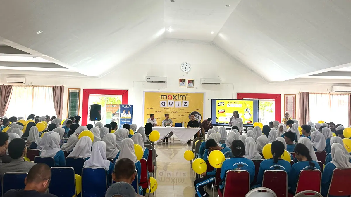 CERDAS CERMAT: Maxim sukses menggelar ‘Maxim Quiz: English Brain Game’ yang merupakan kompetisi cerdas cermat antar pelajar yang diselenggarakan di SMK Negeri 8 Medan, Rabu (3/6/2026).(Dok: Maxim Indonesia)
