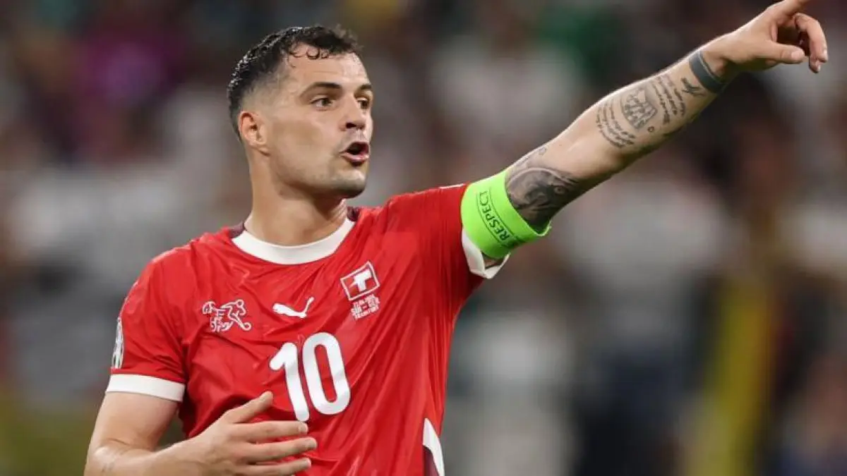 Granit Xhaka memimpin Swiss menghadapi Aljazair pada babak 32 besar Piala Dunia 2026 di BC Place, Vancouver, demi mengamankan tiket ke babak 16 besar. (bbc.co)