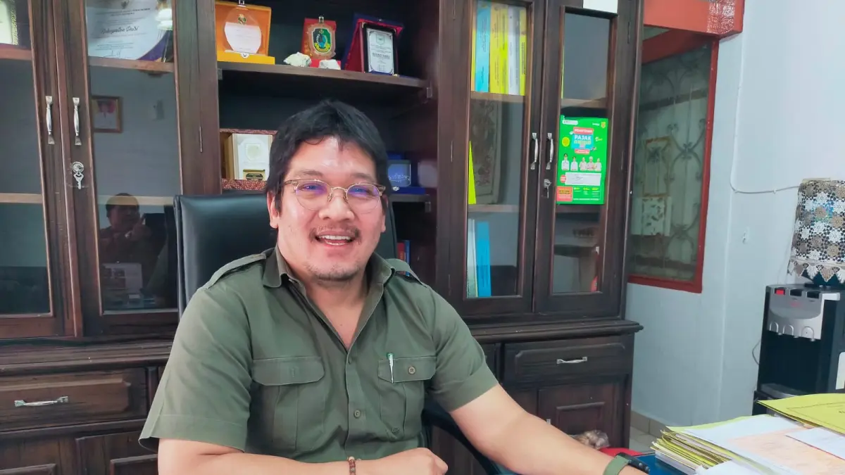 Kepala Bapenda Dairi, Robot Simanulang. (RUDY SITANGGANG/SUMUT POS)