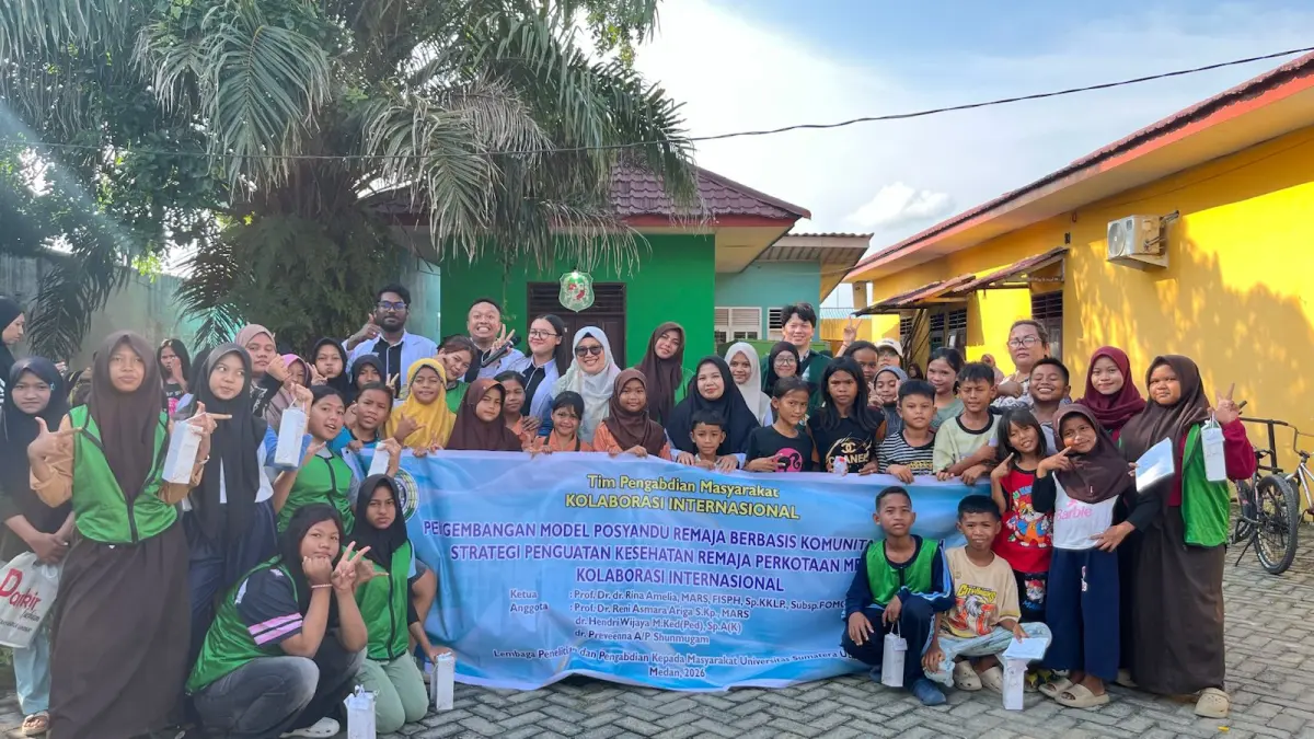 Tim Pengabdian kepada Masyarakat USU saat melaksanakan kegiatan program Pengembangan Model Posyandu Remaja Berbasis Komunitas, di Kelurahan Sicanang, Kecamatan Medan Belawan, Kota Medan. (Sumut Pos/Dokumen Pribadi)