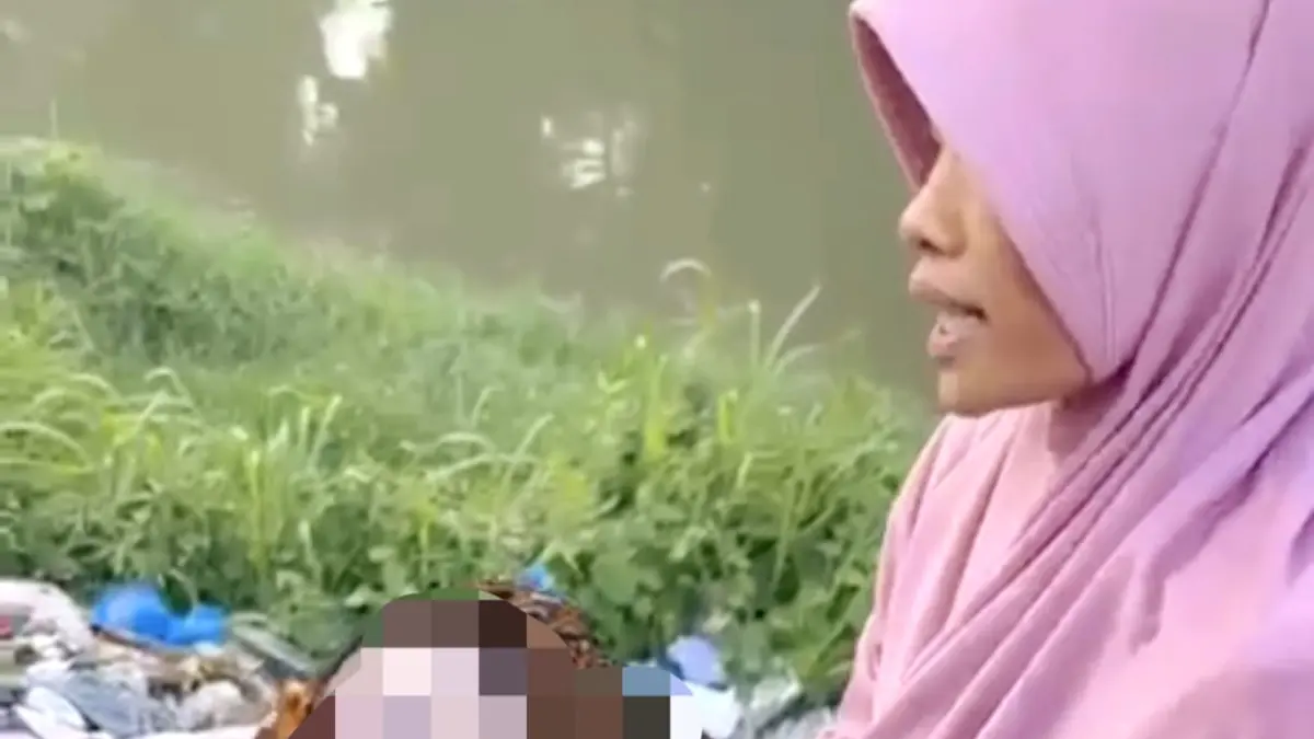 
Potongan video saat bayi laki-laki ditemukan yang diduga dibuang. (Istimewa/Sumut Pos)
