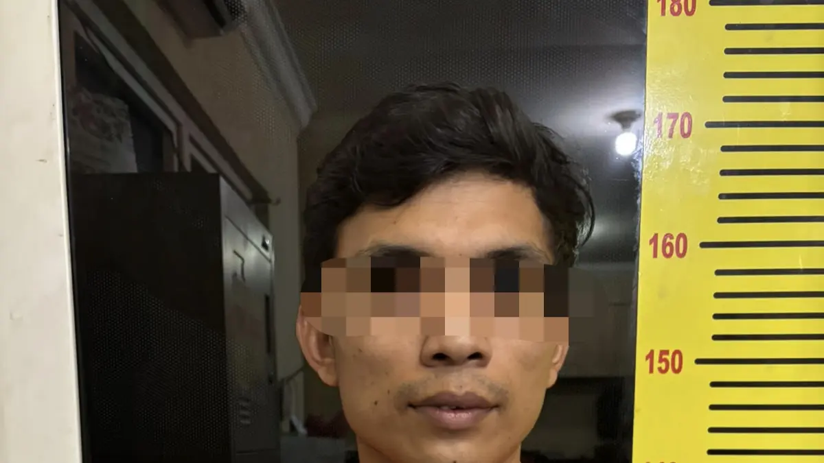 RI alias KD saat pakai baju tahanan. (Satreskrim Polres Langkat/Sumut Pos)