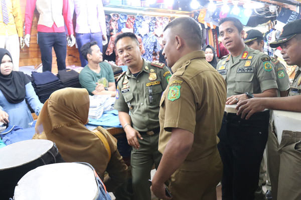 markus/sumut pos TERJARING: Tim Satpol PP, BKD & PSDM Kota Medan mendapati seorang ASN yang bolos di jam kerja.