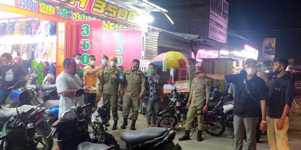 IMBAU: Petugas Satpol PP Asahan mengimbau pengusaha kafe dan warnet untuk menutup usaha pada pukul 21.00 WIB.