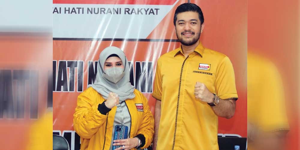 KOMPAK: Ketua Partai Hanura Sumut EL Adrian Shah, kompak bersama Sekretaris Hanura Sumut Sekretaris Hj Riri Stephanie Siregar.