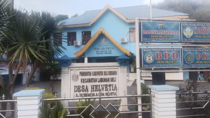 DEPAN: Kantor Desa Helvetia, Kecamatan Labuhan Deli, Kabupaten Deliserdang tampak dari depan.