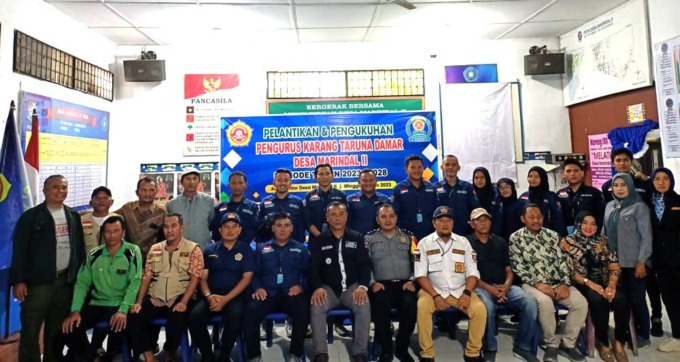 FOTO BERSAMA: Pengurus Karang Taruna Damar  Desa Marindal II periode 2023-2028  foto bersama dengan Kepala Desa Marindal II, Jufri Antono, Ketua Karang Taruna Patumbak Ismail Nasution, dan perangkat desa, tokoh masyarakat dan pemuda di sela-sela pengukuha