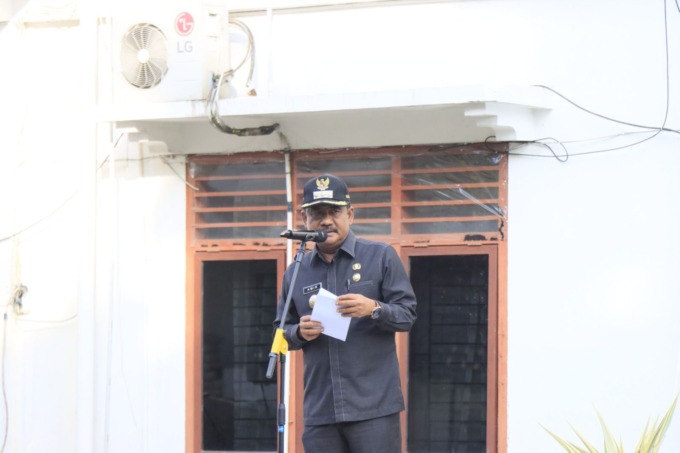 BACA: Wali Kota Binjai, H Amir Hamzah saat membacakan sambutan Presiden Jokowi dalam upacara HBN.Istimewa/Sumut Pos.