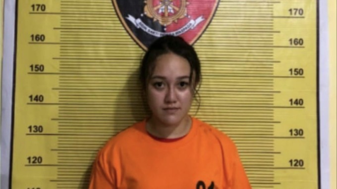 Asri Nurmala Sitepu atau ANS yang dihukum percobaan oleh hakim saat pakai baju tahanan Polres Binjai. (Istimewa)