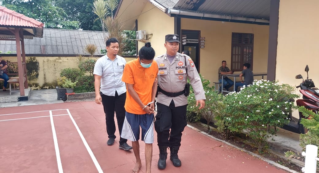 Pelaku cabul yang merupakan karyawan salah satu perusahaan di Lagoi saat digiring ke ruang penyidik Unit Reskrim Polsek Bintan Utara, Selasa (22/9/2024) siang.