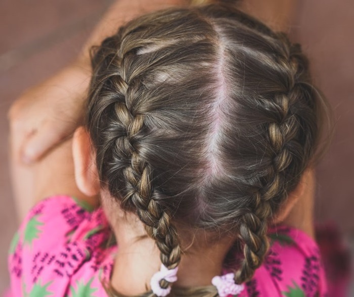 ILUSTRASI. Gaya rambut kepang dua pada anak perempuan merupakan gaya klasik yang tetap bertahan hingga kini.