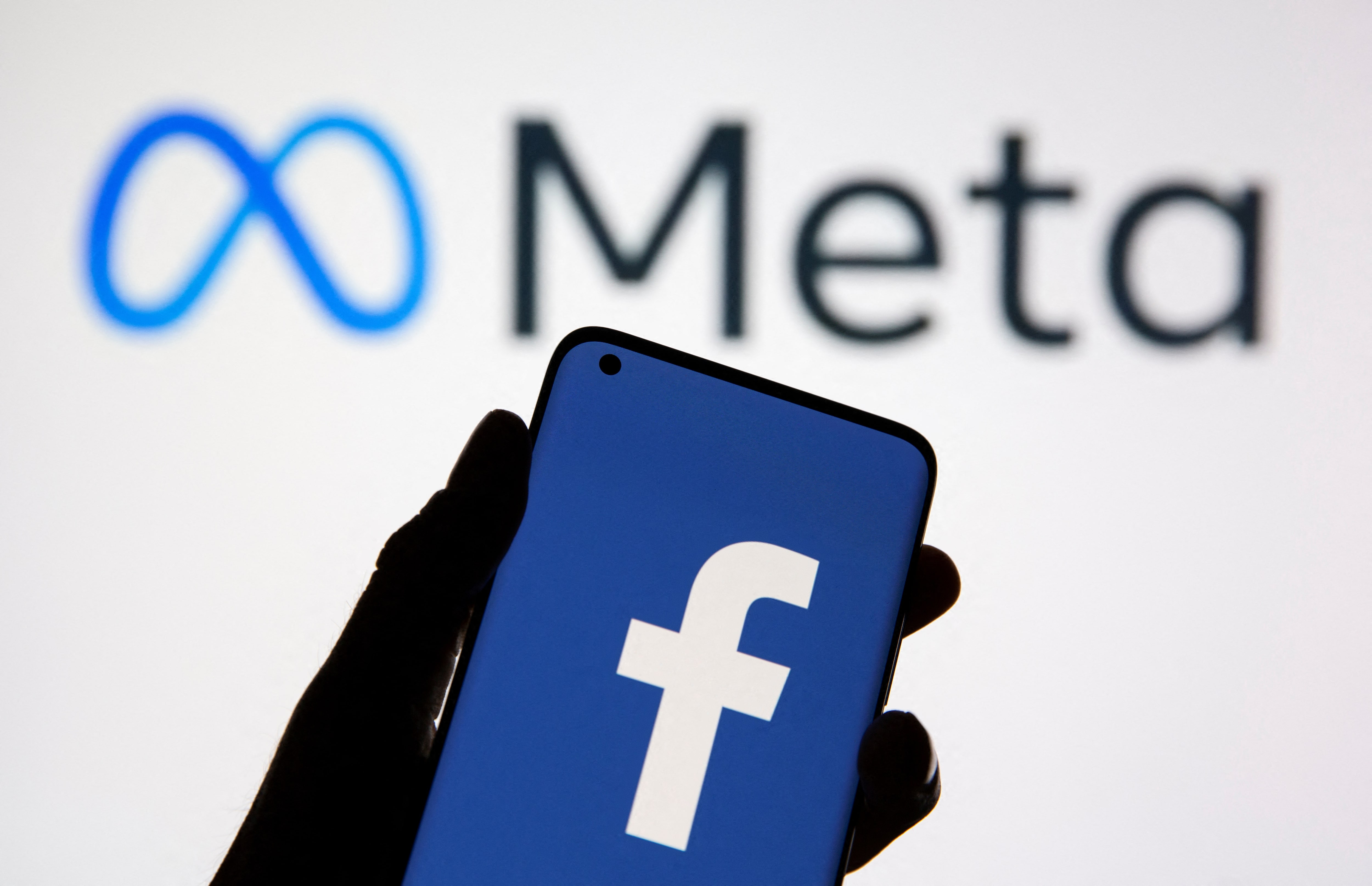 ILUSTRASI Meta dengan logo media sosial Facebook.