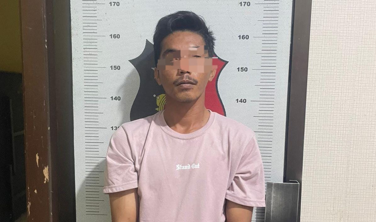 A, pelaku Pencabulan atas teman dekatnya Sendiri, kini diamankan di Mapolsek Gunung Kijang, Bintan. F Slamet Nofasusanto/Batam Pos