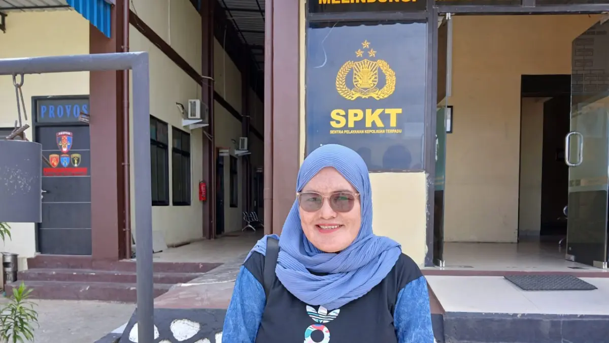 MANTAN Kepala Dapur MBG Air Asuk, Nurhayani usai melaporkan Hasnidar ke Polres Kepulauan Anambas. F Ihsan Imaduddin/Batam Pos